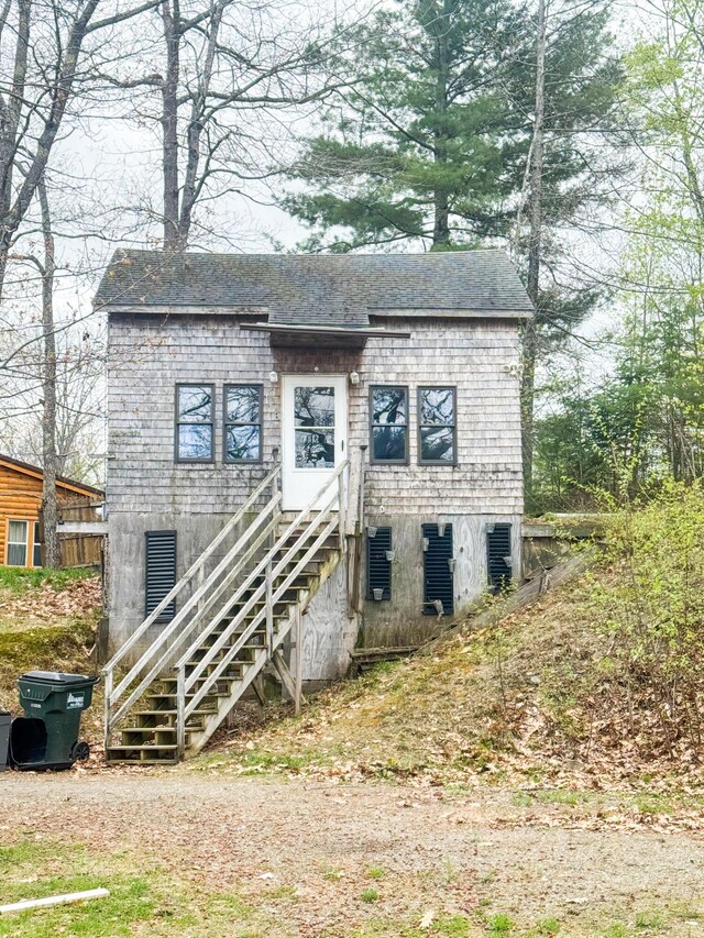 108/9 113 Sandy Beach Rd, Glenburn, ME 04401 - view of front of property with stairway and a shingled roof