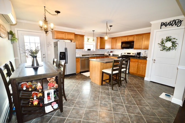 kitchen featuring backsplash, a wealth of natural light, a wall mounted AC, and stainless steel appliances