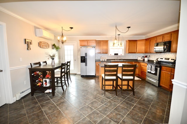 kitchen featuring an AC wall unit, ornamental molding, dark countertops, appliances with stainless steel finishes, and a baseboard heating unit