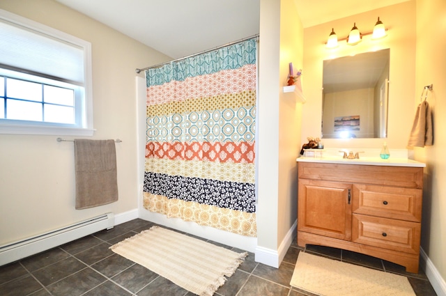 bathroom with a baseboard radiator, a shower with shower curtain, baseboards, and tile patterned floors