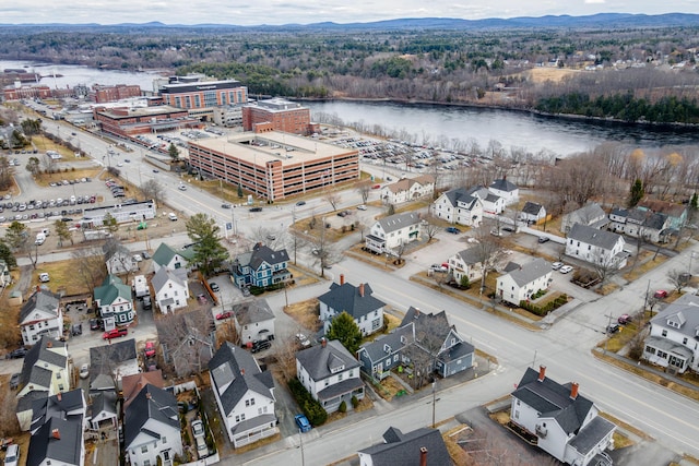 aerial view featuring a water and mountain view