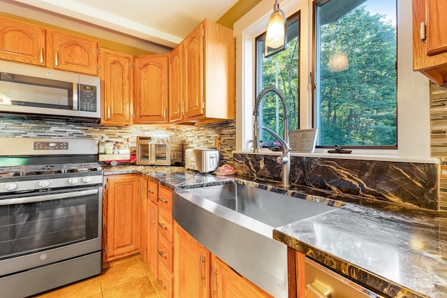 252 General Turner Hill Rd, Turner, ME 04282 - kitchen featuring tasteful backsplash, appliances with stainless steel finishes, and a sink
