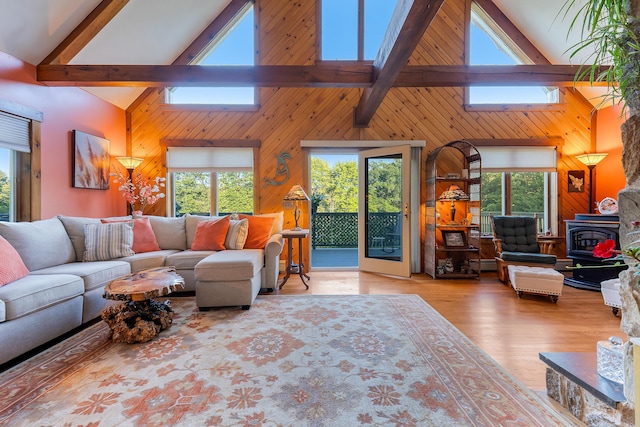252 General Turner Hill Rd, Turner, ME 04282 - living area with beam ceiling, a skylight, high vaulted ceiling, and plenty of natural light