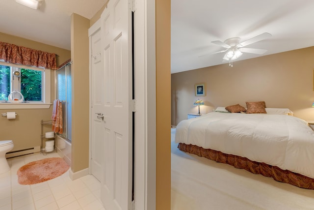 252 General Turner Hill Rd, Turner, ME 04282 - bedroom with light tile patterned floors, a baseboard radiator, ceiling fan, and baseboards