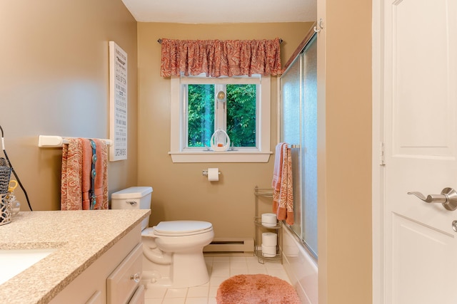 252 General Turner Hill Rd, Turner, ME 04282 - full bath featuring baseboards, toilet, baseboard heating, vanity, and tile patterned flooring