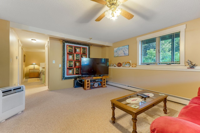 252 General Turner Hill Rd, Turner, ME 04282 - living area featuring ceiling fan, heating unit, carpet, a textured ceiling, and a baseboard heating unit