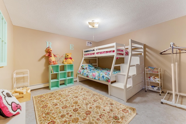 252 General Turner Hill Rd, Turner, ME 04282 - bedroom with carpet flooring, baseboard heating, and a textured ceiling