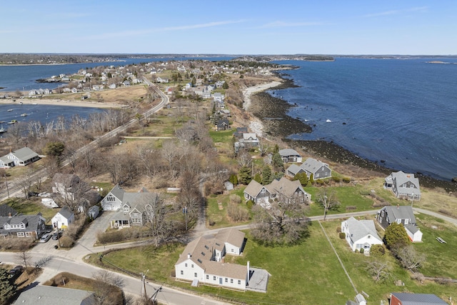 bird's eye view featuring a residential view and a water view