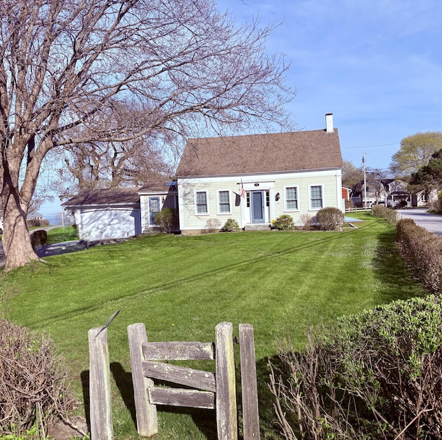 6 Barker Point Rd, Harpswell, ME 04003 - cape cod house with a chimney and a front lawn