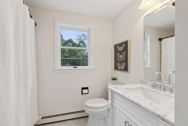 bathroom with a baseboard heating unit, toilet, and vanity