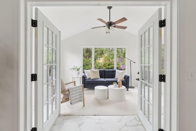 sunroom featuring french doors and vaulted ceiling
