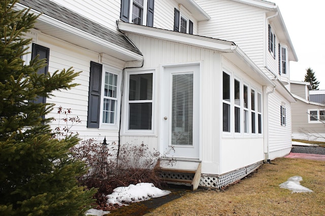 165 Pleasant Ave, Madawaska, ME 04756 - view of side of home featuring a sunroom