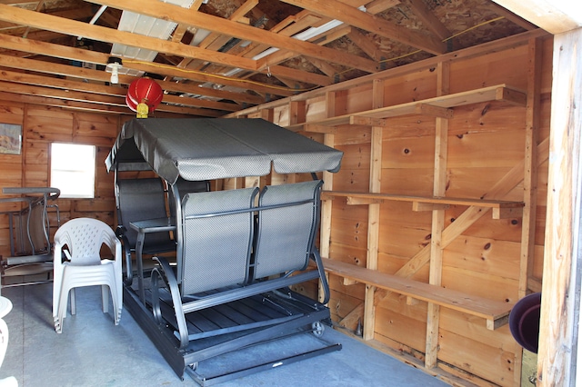 165 Pleasant Ave, Madawaska, ME 04756 - misc room featuring concrete flooring and wood walls