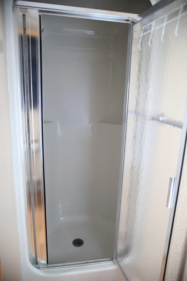 165 Pleasant Ave, Madawaska, ME 04756 - full bathroom with a shower stall