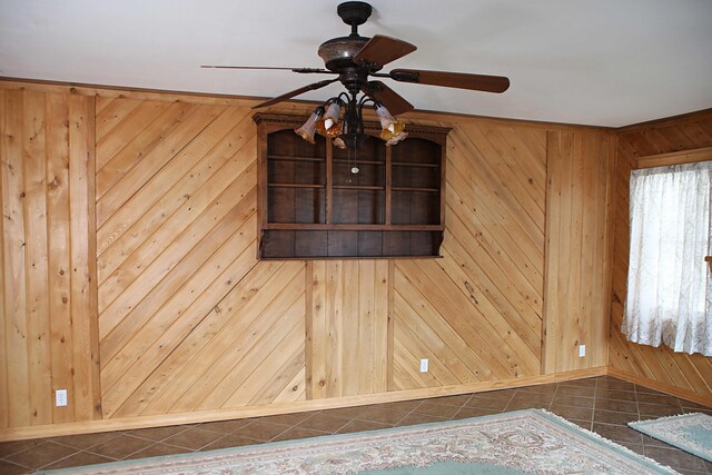 165 Pleasant Ave, Madawaska, ME 04756 - detailed view of a ceiling fan, wooden walls, and baseboards