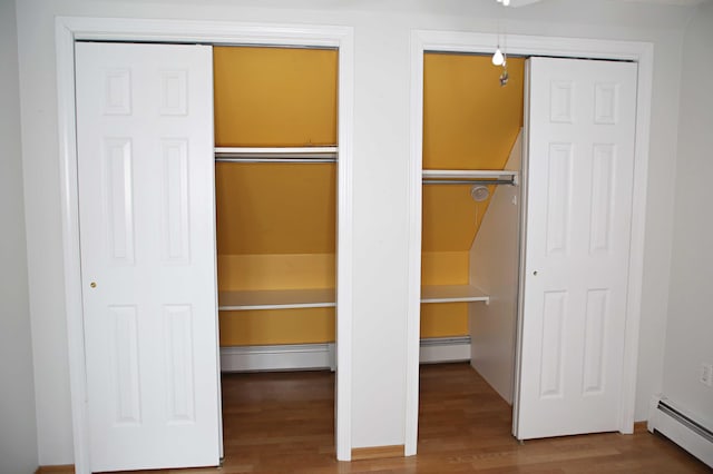 165 Pleasant Ave, Madawaska, ME 04756 - closet featuring baseboard heating and a baseboard radiator