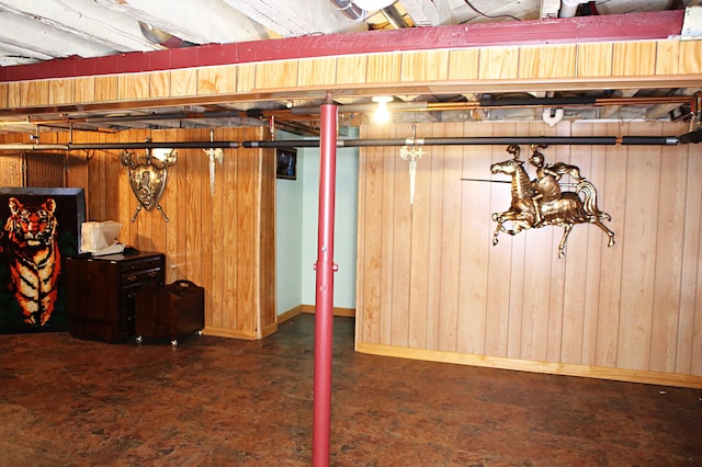 165 Pleasant Ave, Madawaska, ME 04756 - below grade area featuring wood walls and baseboards