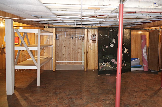 165 Pleasant Ave, Madawaska, ME 04756 - unfinished basement featuring wood walls