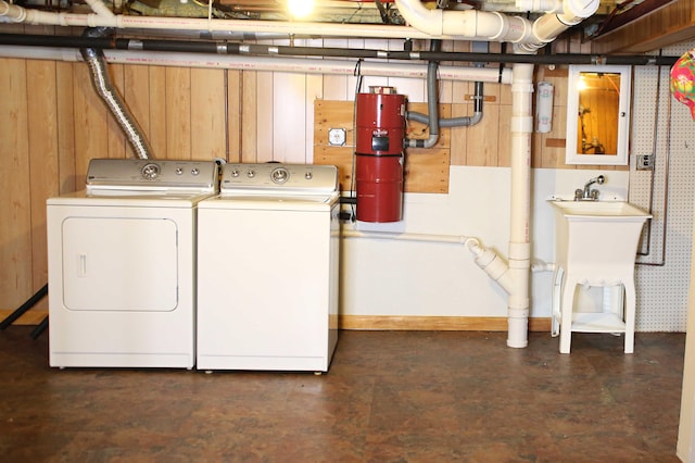 165 Pleasant Ave, Madawaska, ME 04756 - laundry area with washer and clothes dryer and baseboards