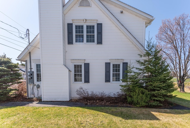 165 Pleasant Ave, Madawaska, ME 04756 - view of side of property featuring a lawn