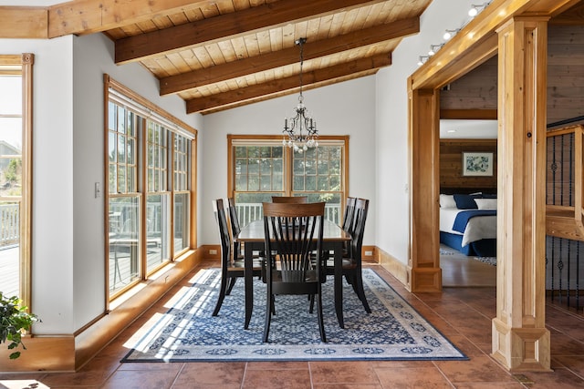 dining area with wooden ceiling, baseboards, lofted ceiling with beams, tile patterned floors, and a notable chandelier