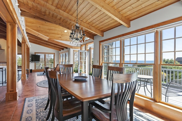 tiled dining area featuring wood ceiling, a notable chandelier, and vaulted ceiling with beams