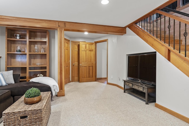 carpeted living area featuring baseboards, recessed lighting, and stairway