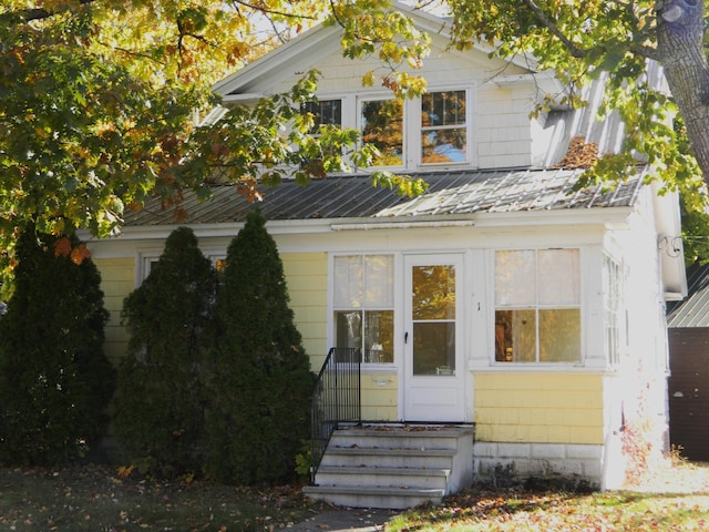 1 Prospect St, Sanford, ME 04083 - view of front facade featuring entry steps and metal roof
