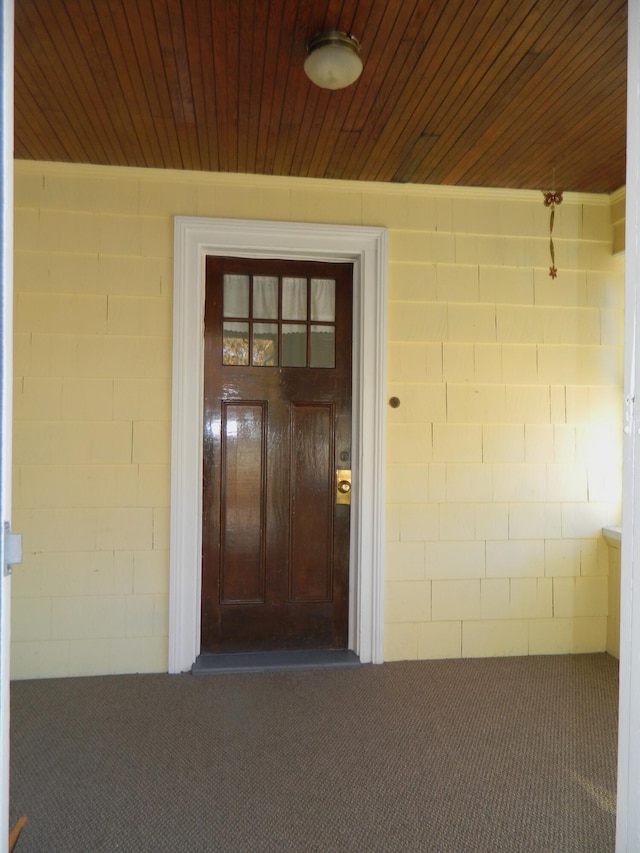 1 Prospect St, Sanford, ME 04083 - property entrance featuring concrete block siding