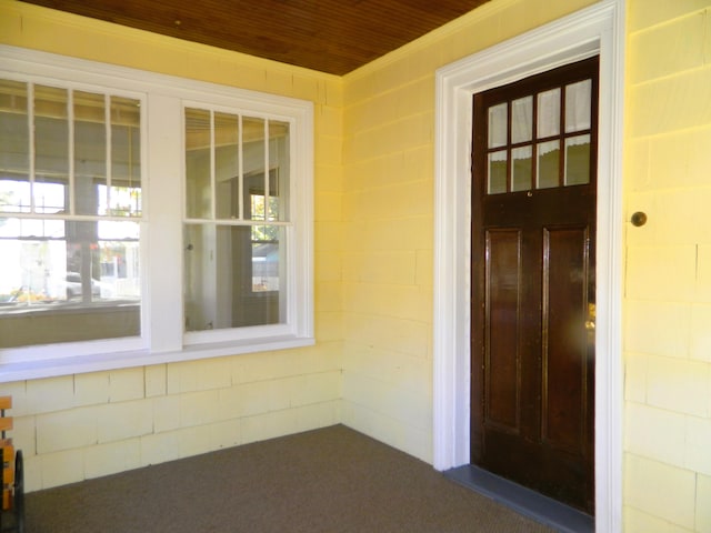 1 Prospect St, Sanford, ME 04083 - entrance to property with a porch and concrete block siding