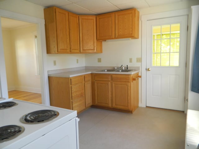 1 Prospect St, Sanford, ME 04083 - kitchen featuring a paneled ceiling, a sink, light countertops, and electric stove