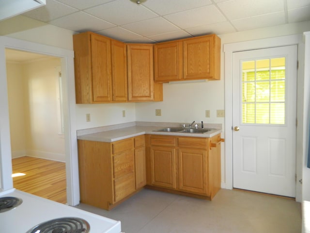 1 Prospect St, Sanford, ME 04083 - kitchen featuring light countertops, a paneled ceiling, a sink, and range with electric stovetop