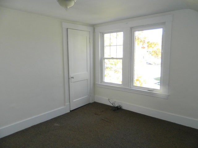 1 Prospect St, Sanford, ME 04083 - unfurnished room with dark colored carpet and baseboards