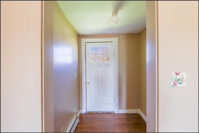 21 Exeter Rd, Corinna, ME 04928 - entryway with baseboards, wood finished floors, a baseboard heating unit, and ornamental molding