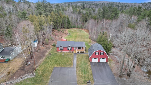 bird's eye view featuring a forest view