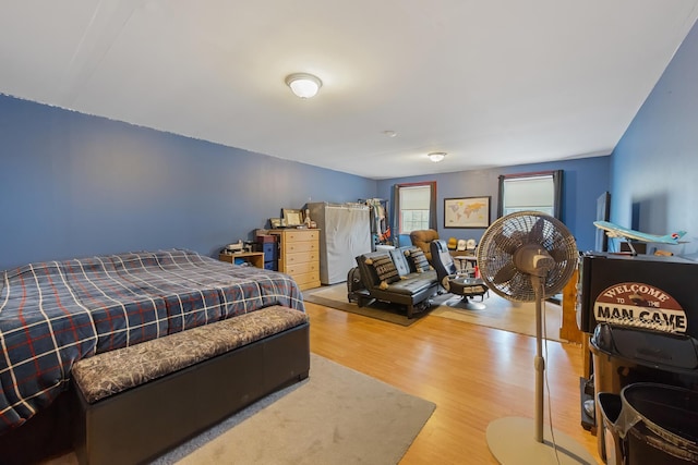 bedroom featuring wood finished floors