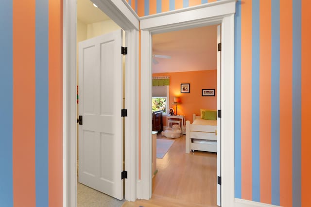 hallway featuring light wood-style flooring
