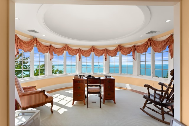 interior space with recessed lighting, visible vents, baseboards, and a water view
