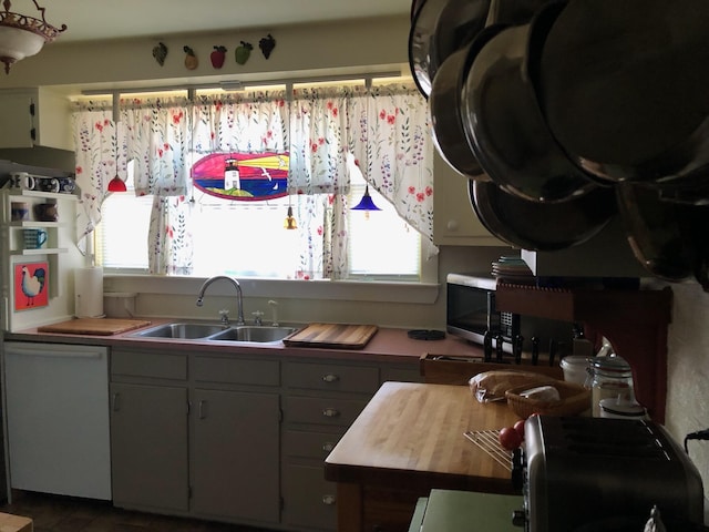 57 Salmond St, Belfast, ME 04915 - kitchen with a sink, healthy amount of natural light, dishwasher, and stainless steel microwave
