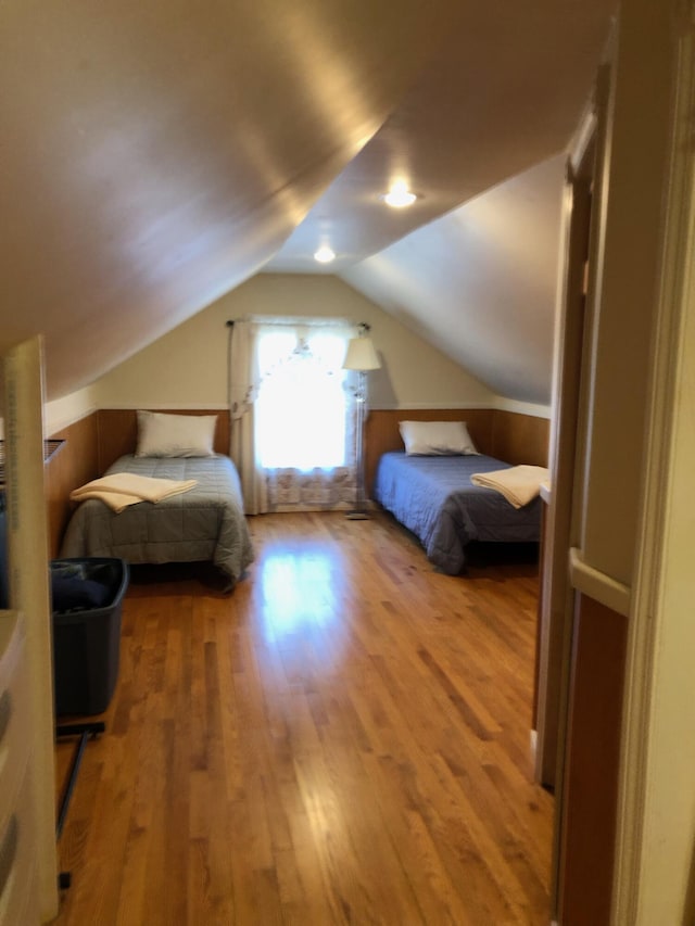 57 Salmond St, Belfast, ME 04915 - bedroom featuring wood finished floors and vaulted ceiling