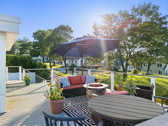 21 Atlantic St, Rockland, ME 04841 - wooden terrace featuring an outdoor living space with a fire pit