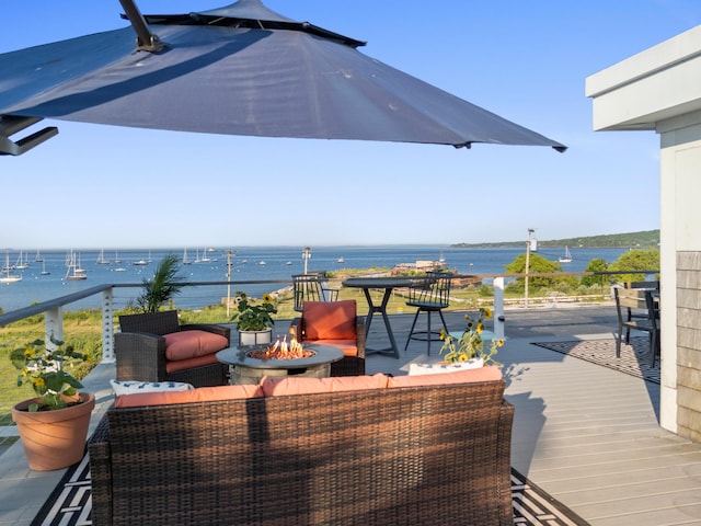 21 Atlantic St, Rockland, ME 04841 - view of patio featuring a fire pit and a water view