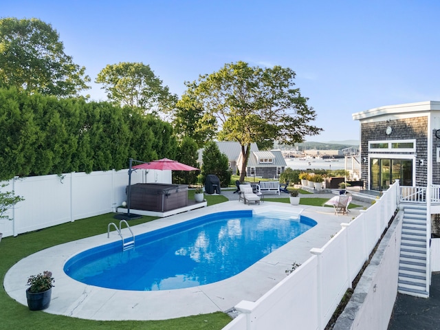21 Atlantic St, Rockland, ME 04841 - view of pool featuring a hot tub, a fenced backyard, and a patio