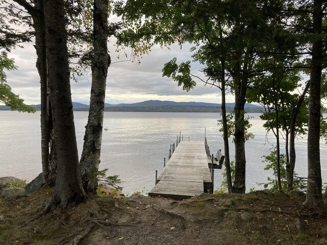 747 S Shore Dr Unit 6, Rangeley Plt, ME 04970 - dock with a water and mountain view