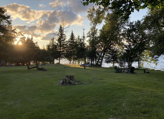 747 S Shore Dr Unit 6, Rangeley Plt, ME 04970 - view of property's community with a lawn