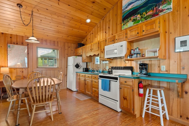 747 S Shore Dr Unit 6, Rangeley Plt, ME 04970 - kitchen with white appliances, light wood-style floors, lofted ceiling, wood walls, and a sink
