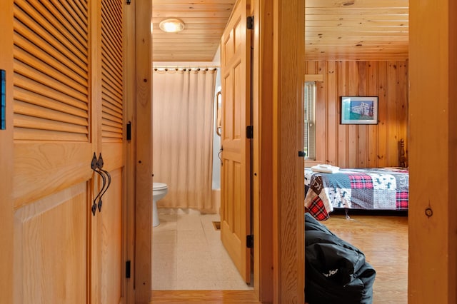 747 S Shore Dr Unit 6, Rangeley Plt, ME 04970 - hall with wooden ceiling and wood walls