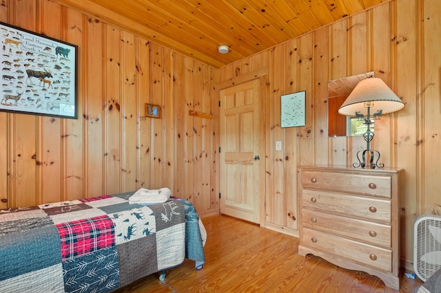 747 S Shore Dr Unit 6, Rangeley Plt, ME 04970 - bedroom with wood finished floors, wooden walls, and wooden ceiling
