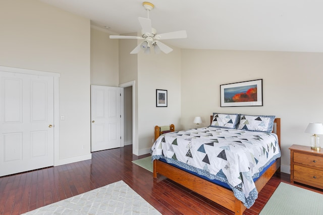 bedroom with high vaulted ceiling, baseboards, a ceiling fan, and wood finished floors