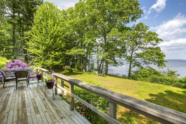 33 Crest St, Northport, ME 04849 - deck with a water view, a lawn, and outdoor dining space
